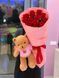 Teddy bear with roses
